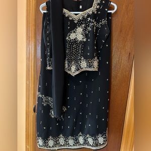 Beautiful black lehenga with sequins and embroidery.